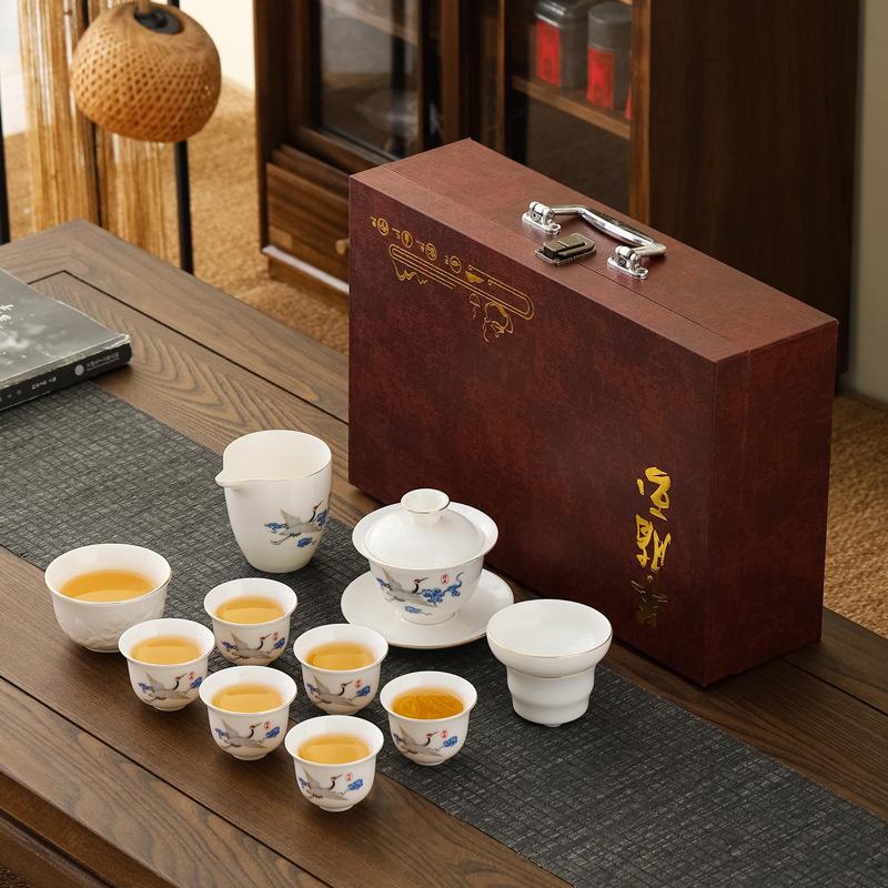 Suet jade porcelain Kung Fu tea tea set, household full set of ceramic tea cup cover bowl Dehua white porcelain tea maker