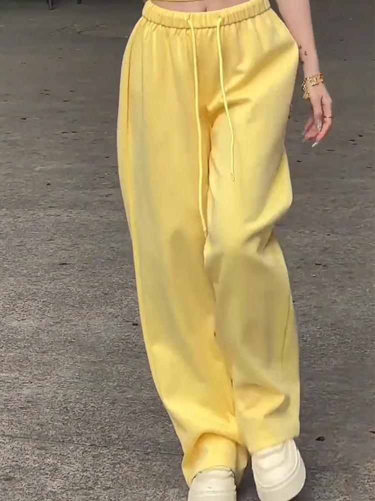 Шикарный и удобный женский летний комплект: Пикантный облегающий топ и широкие брюки