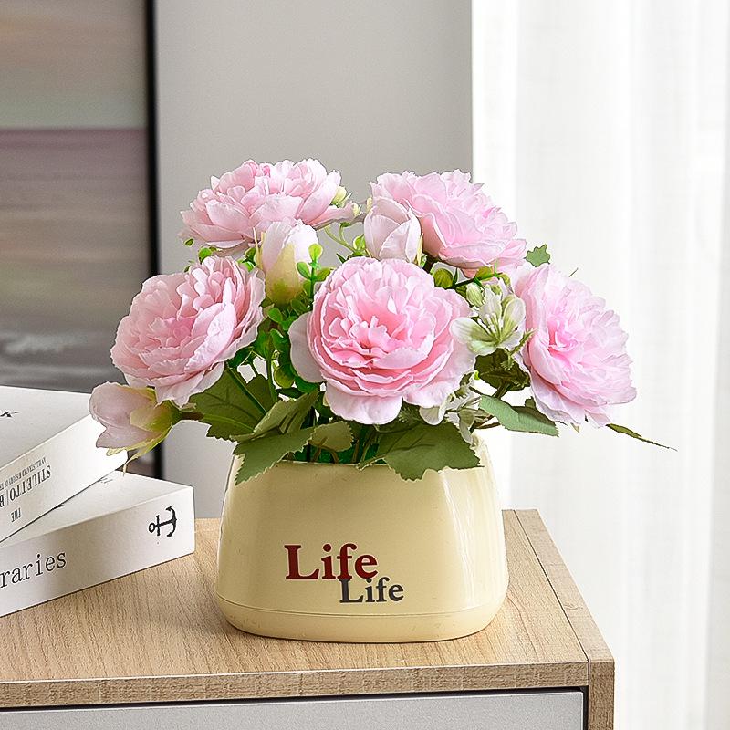 Living Room Decor: Artificial Sunflower and Green Plant Arrangements, Small Potted Plants, and Plastic Bouquets