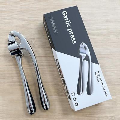 Ручной пресс для чеснока и толкушка для использования на кухне