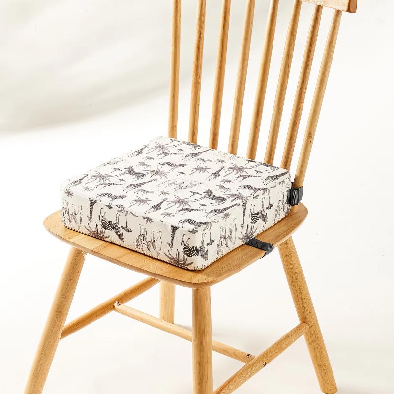 Portable waterproof booster seat cushion for babies, perfect for outdoor use.