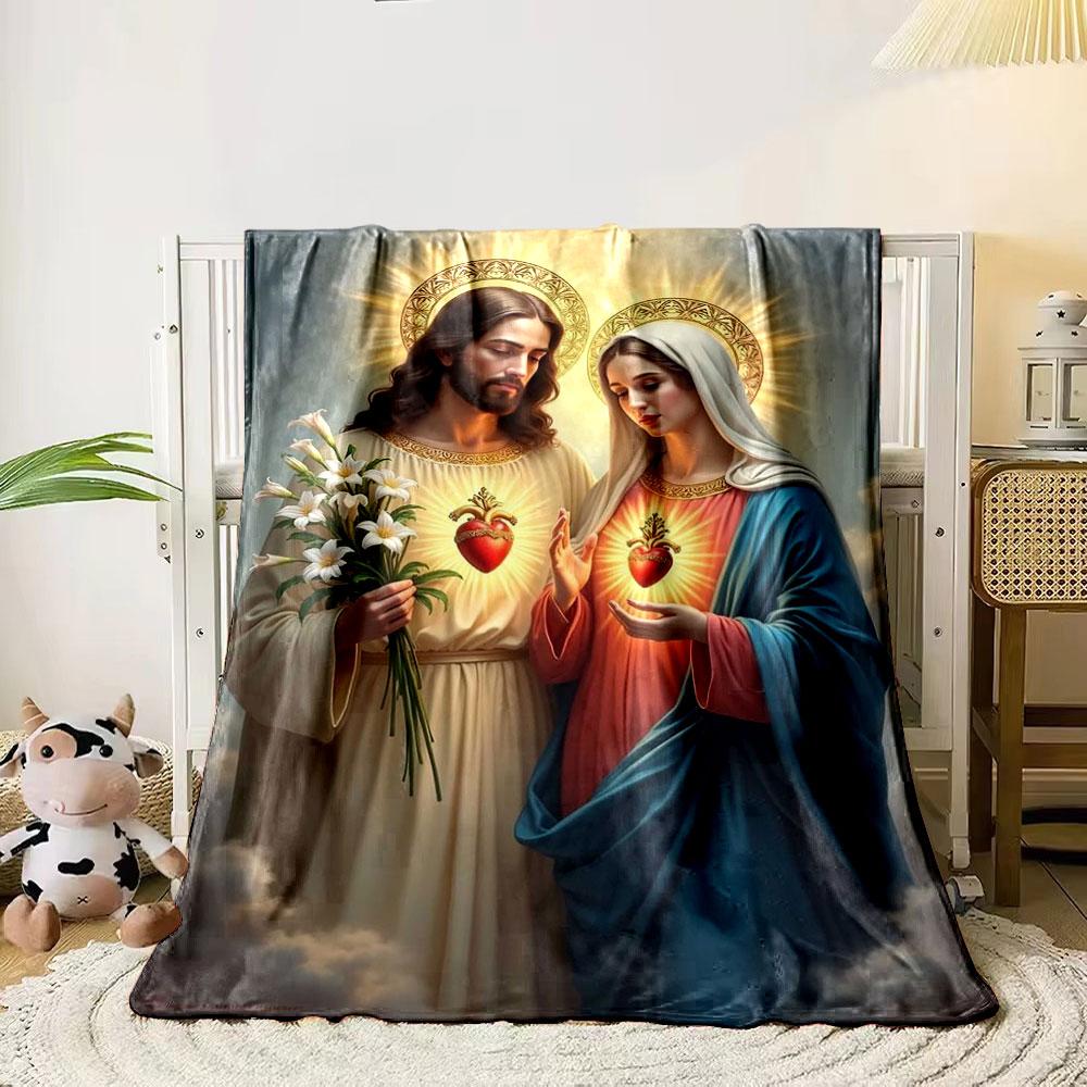 Two figures with glowing halos, sacred hearts, lilies, and radiant light. for all seasons blanket lunch break throw gift