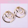 Women Gold Metal Earrings With Geometric Shape Electroplated For Fashion And Office Looks