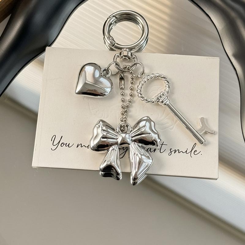 Elegant Heart Phone Bag Accessory Fashionable Silver Bowknot Keychain with Heart Charm Unique Keyrings Accessory