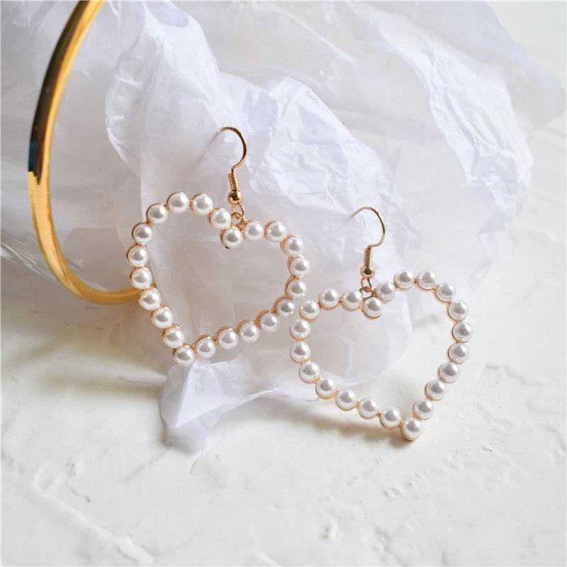 Korean S925 Sterling Silver Pearl Stud Earrings - Trendy and Elegant Design