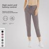 Women's Quick-Dry Yoga Pants: Breathable, Loose-Fit, Nine-Point Length with Drawstring for Running and Fitness.