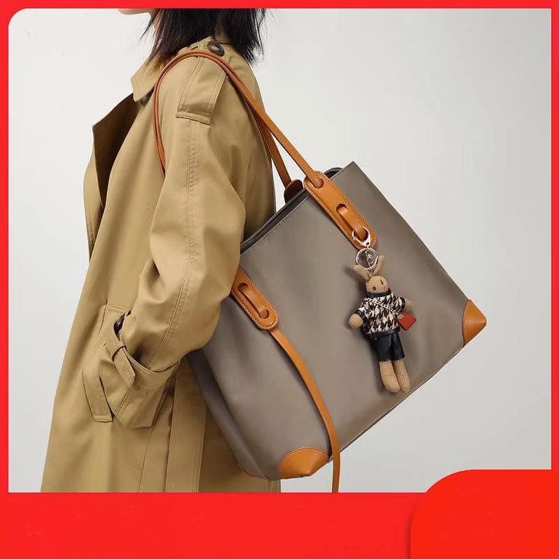 Women's bag, new tote bag, shoulder large capacity, senior feeling, foreign style 2025 large bag, canvas women's bag, bucket bag.