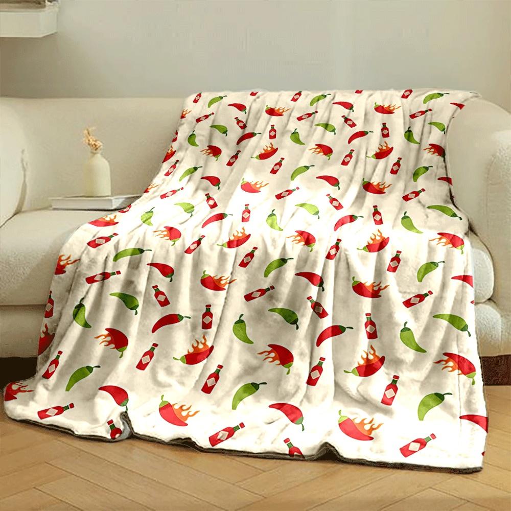 The pattern shows chilies, hot sauce bottles, and flaming chili peppers. for all seasons blanket lunch break throw gift
