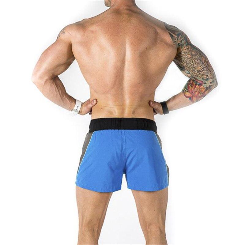 Muscleguys Мужская спортивная одежда, летние шорты для фитнеса и йоги, дышащие брюки с тремя точками, шорты до колена для утренних пробежек, облегающие шорты