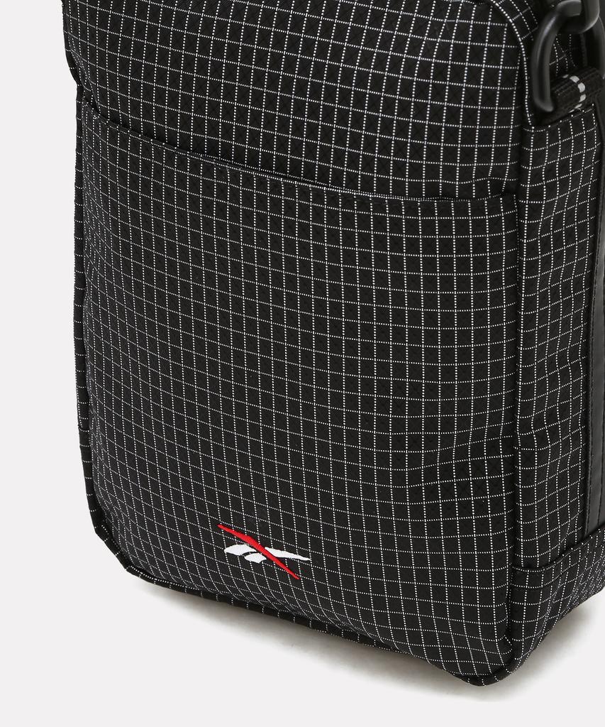 Reebok Мини-сумка через плечо в сетку - Черная