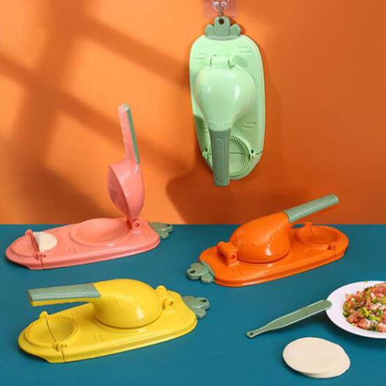 Производитель кожи для пельменей Пищевой класс Эргономичная ручка Высокоэффективное стабильное основание Конструкция с подвесным отверстием Экономия труда Пластиковое тесто Машина для прессования кожи пельменей