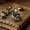Natural vintage women's leaf wrap ring in silver tone with engraved leaves and inlaid oval green synthetic gemstones, bohemian style fashion