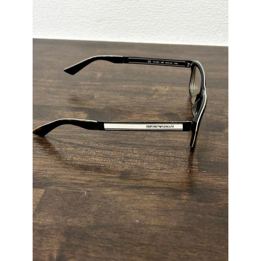 Used Emporio Armani glasses case with glasses wipe