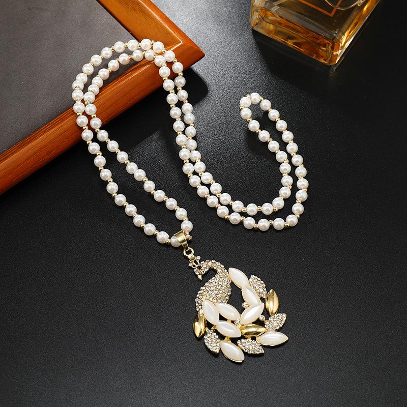 Длинное и изысканное колье, хрустальный кулон, цепочка для свитера, высококачественное и универсальное колье, простые и высококачественные аксессуары для цепочки для свитера.