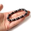 Браслет из Терагерцовой руды Хокутолит Черный 8мм Камень силы дальнего инфракрасного диапазона Внутренний обхват 15см [ЗОЛОТОЙ КАМЕНЬ] Прибл.
