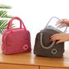 Simple and fashionable heat-insulating and heat-preserving handbag / lunch box. Suitable for students and office workers.