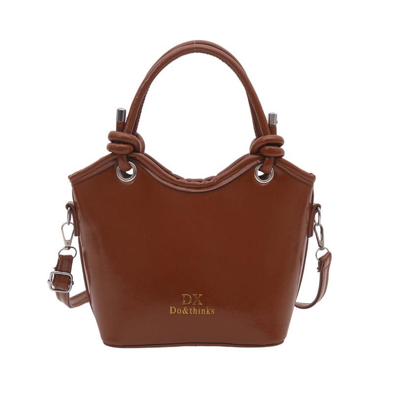 Повседневная простая модная сумка-ведро нишевого дизайна, легкая роскошная женская сумка большой вместимости для通勤, женская наплечная сумка