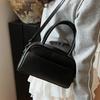 Spring and summer new Korean version niche solid color texture portable pillow bag fashionable commuter style versatile casual messenger women's bag