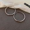 Silver Needle Style Circle Earrings - Simple Korean Metal Design, All-Match Earrings for a Celebrity Look.