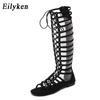 Eilyke High Quality Leather Women Sandals Strappy Open Toe Knee Summer Gladiator Flat Sandals Roman Bandage Casual Boots