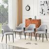 Set of 2 grey fabric dining chairs. Height 83 cm, backrest color-accented combination of fabric and black PU, cross-shaped metal support legs.