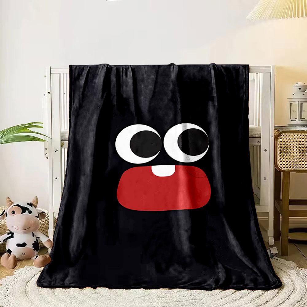 Large cartoon eyes and a red mouth with one tooth on a black background. for all seasons blanket lunch break throw gift