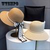 Elegant Pearl Bowknot Sun Hat for Women - Wide Brim, UV Protection Straw Bucket Cap with Chic French Style Design