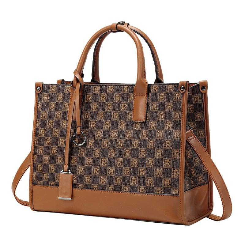 High-end women's handbag 2026 new model niche bucket bag versatile for commuting shoulder and crossbody bag popular women's bag
