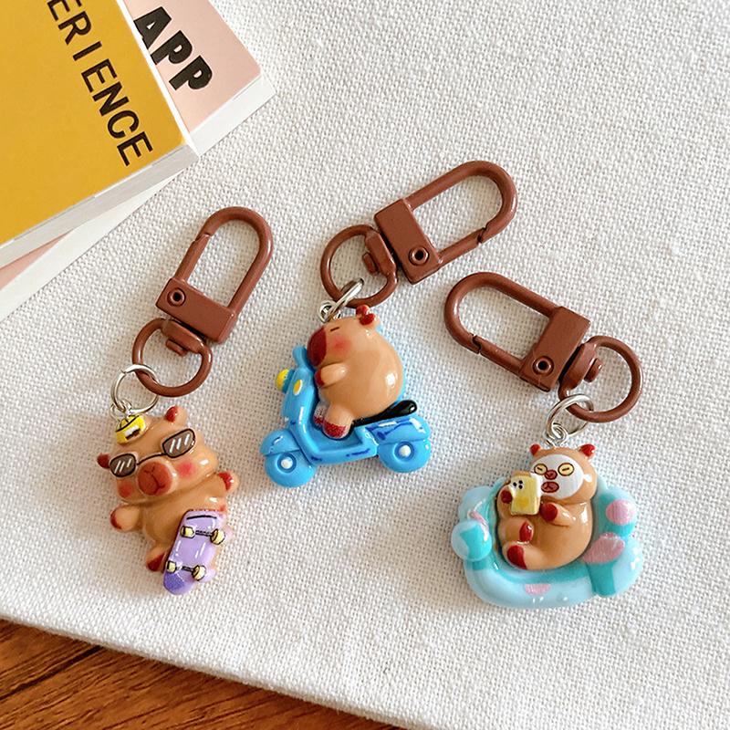 1 шт. мультяшный капибала брелок креативный капибара телефон кулон наушники чехол подвески сумка декор автомобильный брелок аксессуары