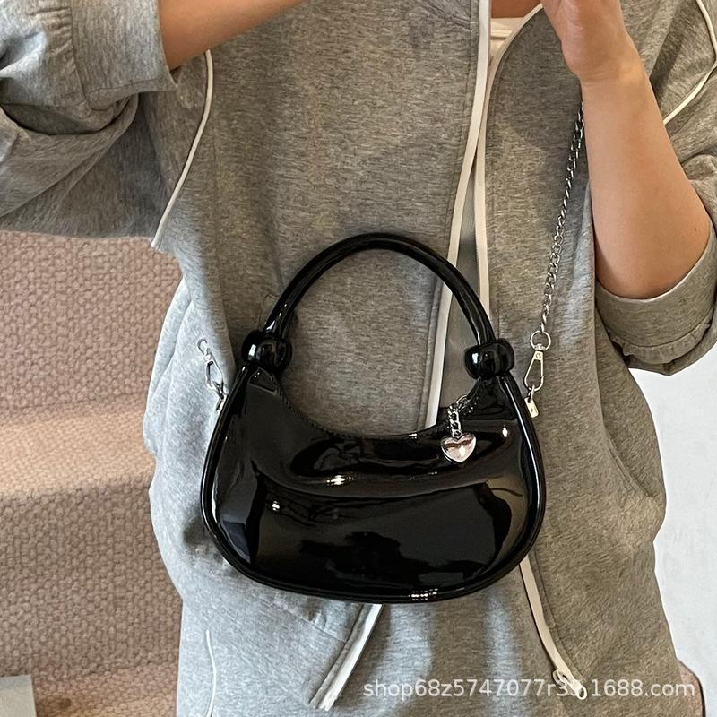 Hand Carry Fashion Trend Dumpling Bag Women 2025 New Simple Versatile Patent Leather Shoulder Bag Niche Design Messenger Bag