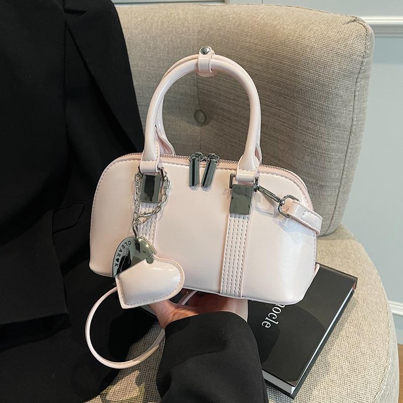 Корейская версия нишевый дизайн простой и универсальный портативный сумка-мессенджер для поездок на работу женская весна 2025 новая модная повседневная сумка-мессенджер