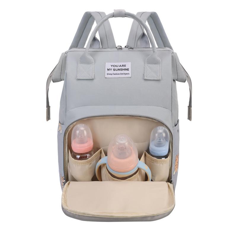 New printed mommy bag, multi-functional backpack, fashionable and cute mother and baby bag, mother bag, portable diaper bag.
