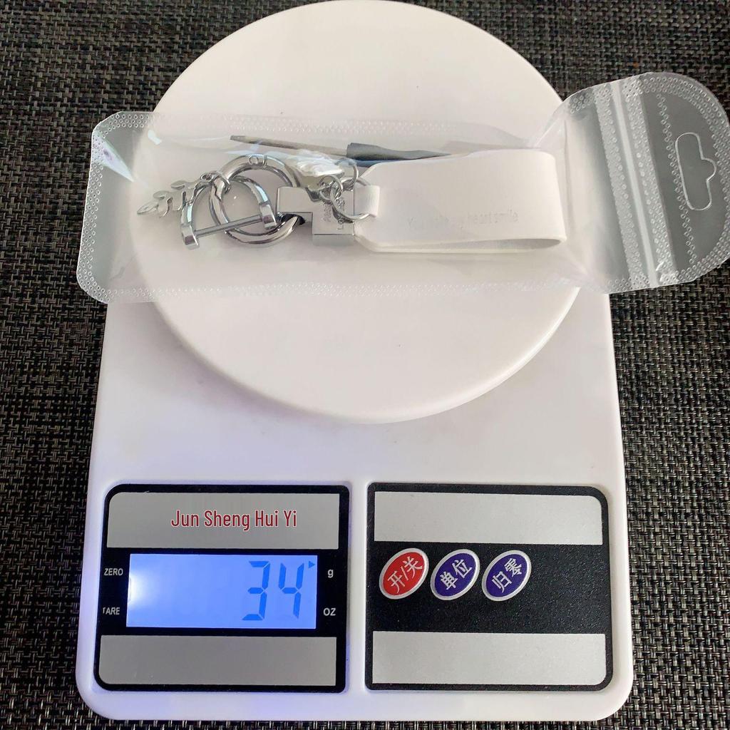 Французский брелок из перламутра: Элегантный шарм для женской сумки «Богиня»