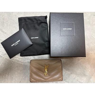 Б/у трехстворчатый кошелек SAINT LAURENT YSL с логотипом, бежевый