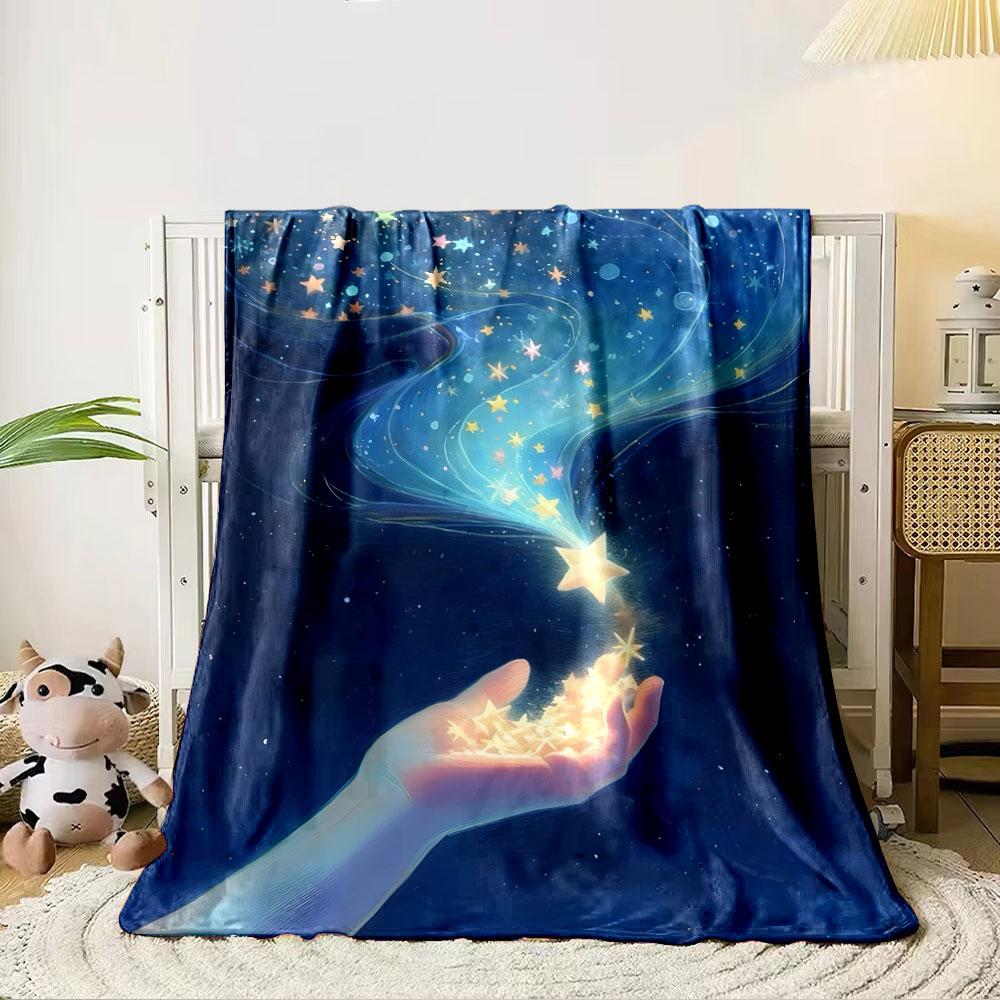 A glowing hand releases radiant stars into a swirling, cosmic night sky. for all seasons blanket lunch break throw gift