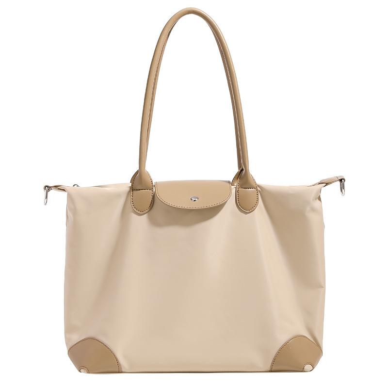 Simple and casual handbag tote bag, dumpling bag, women's briefcase, niche high-end large-capacity crossbody commuter bag