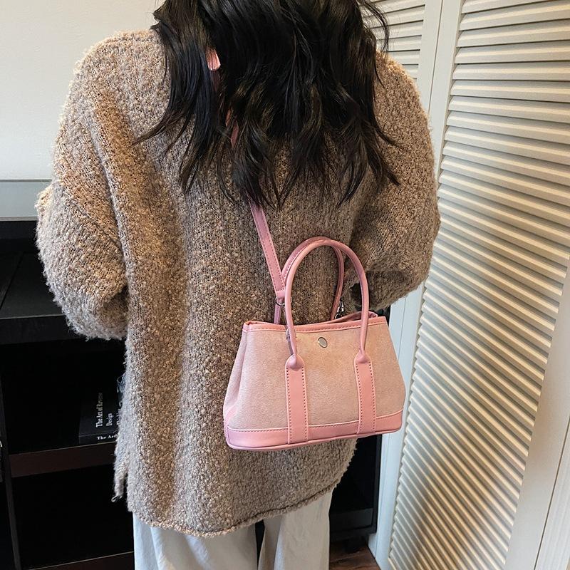 Ретро замшевая женская сумка 2025 осень и зима новая сумка-мессенджер для通勤 леопардовый принт универсальная сумка-ведро