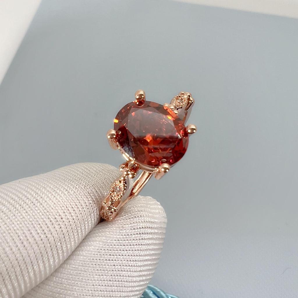 Luxury Simple Egg-Shaped Zircon Ring with Pigeon Blood Red & Pomegranate Gemstones