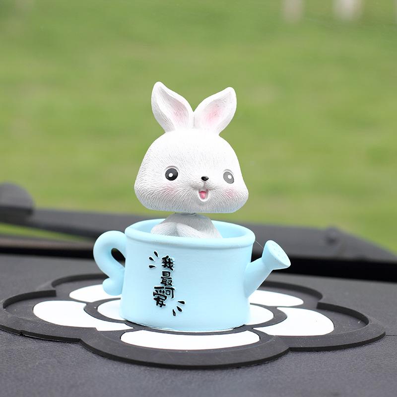 Единорог мультфильм смоляная кукла качающая головой - украшение для автомобиля и праздничный подарок