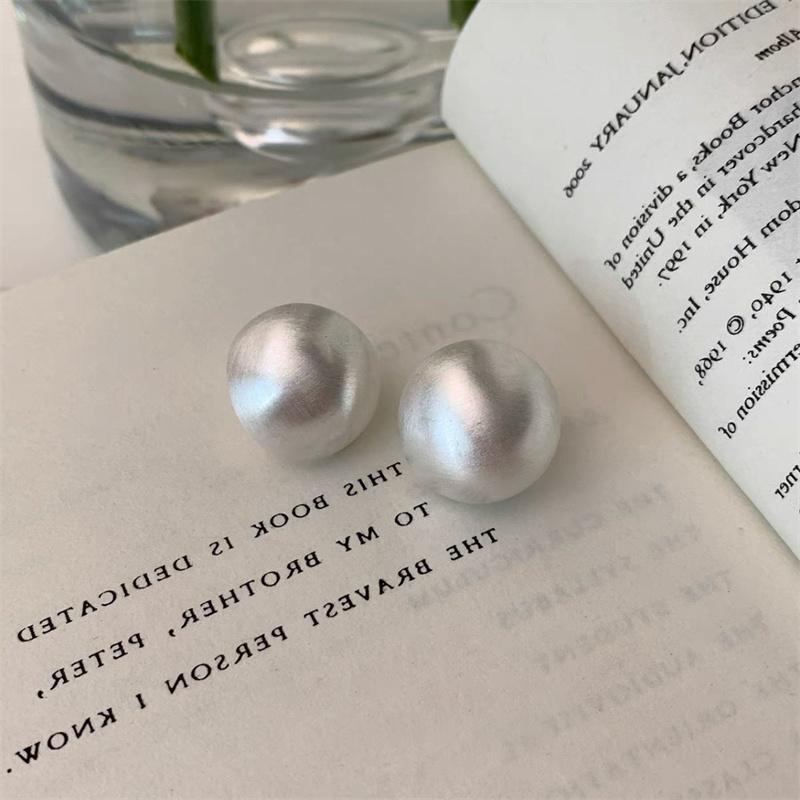 Круглые серьги из матового металла