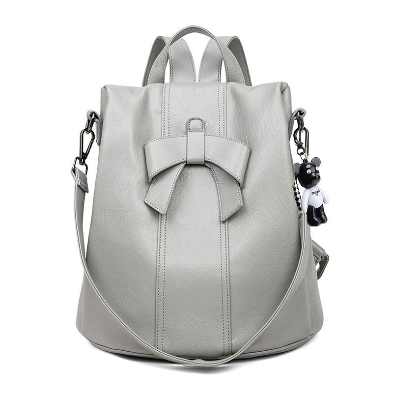 2025 Модные женские рюкзаки с бантом из натуральной кожи, женские школьные сумки из воловьей кожи с защитой от кражи и орнаментом в виде медведя