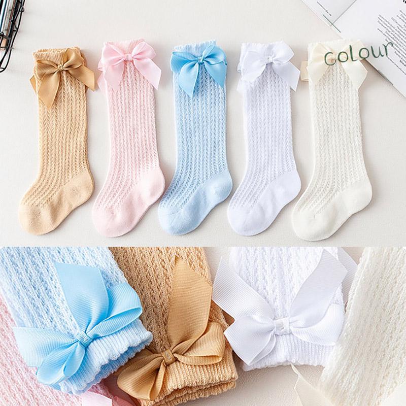 Носочки гольфы для маленькой девочки. Ткань дышащая, цвета нежные, украшены бантиком из ленты