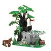 Игрушки-конструкторы MOC — это творческие сборные игрушки и рождественские подарки, представляющие собой модель маленького замка в средневековом лесу.