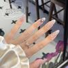 Высококачественные накладные ногти «кошачий глаз» в горошек черного цвета с бантом из стразов