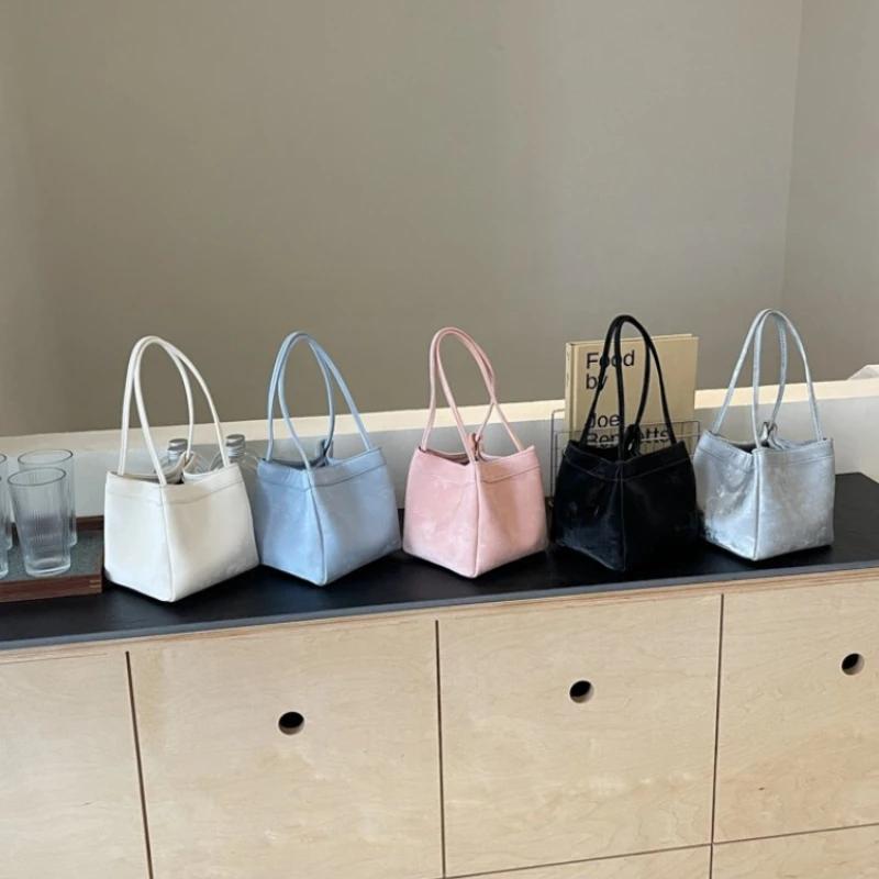 Легкая роскошная сумка-ведро из искусственной кожи с магнитной пряжкой для молодых женщин, модная простая сумка через плечо для женщин