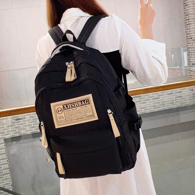 Schoolbag wholesale college students Oxford cloth computer backpack high value simple versatile schoolbag anti-splashing backpack women
