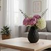 Black geometric decorative vase with an elegant hexagonal pattern