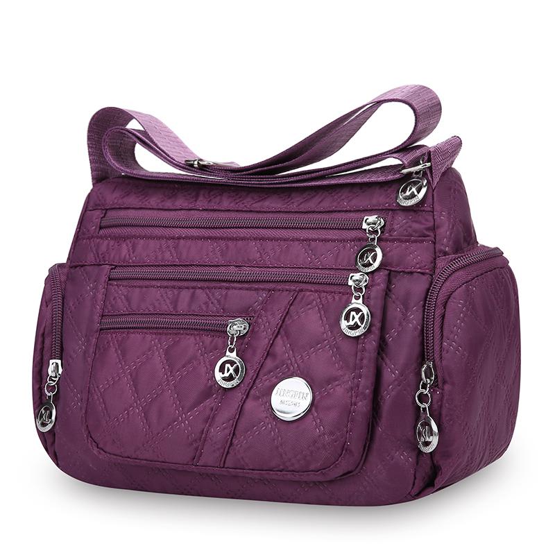 Женская сумка кроссбоди большой вместимости, водонепроницаемая, износостойкая, с несколькими карманами для поездок на работу и активного отдыха.