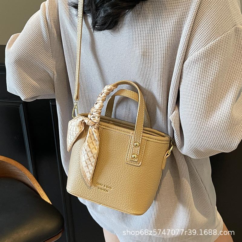 Fashion and High-quality Lychee Pattern Temperament Casual Portable Bucket Bag Women's Versatile Commuting Niche Solid Color PU Messenger Bag