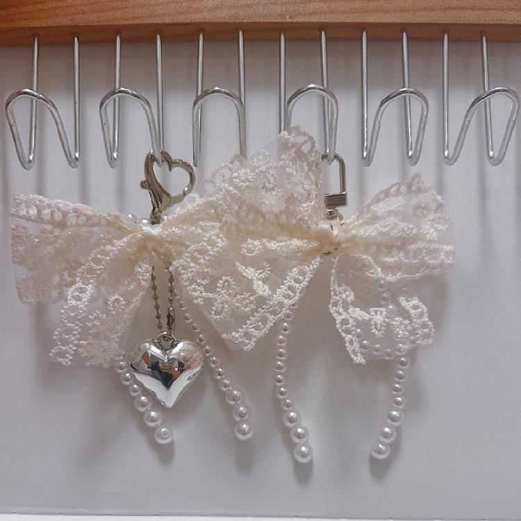 Ключница с жемчугом и бантом Элегантная ключница с бантом и жемчугом Цветной кулон-бант для сумок и телефонов